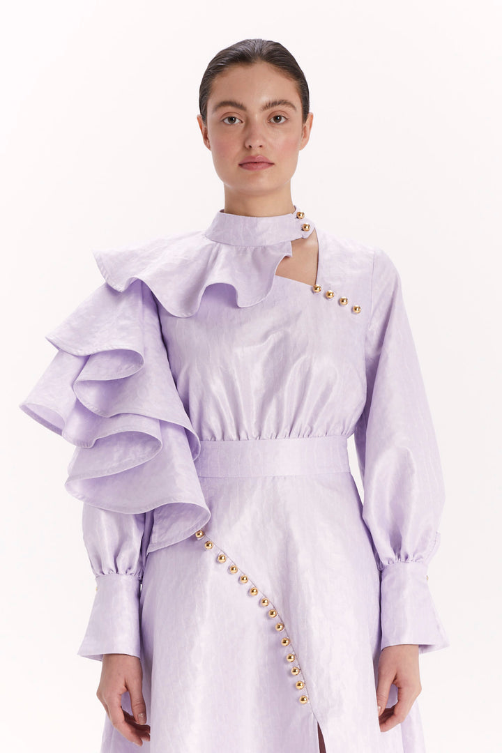 DRESS WITH DECORATIVE BUTTONS AND A SLIT