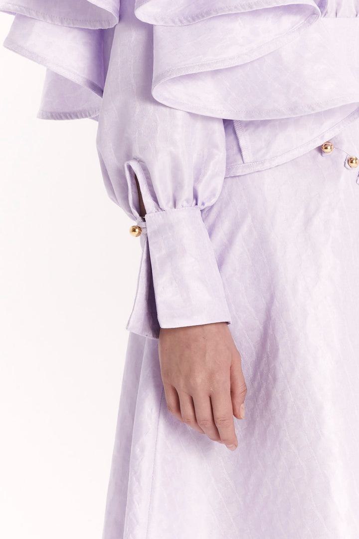 DRESS WITH DECORATIVE BUTTONS AND A SLIT