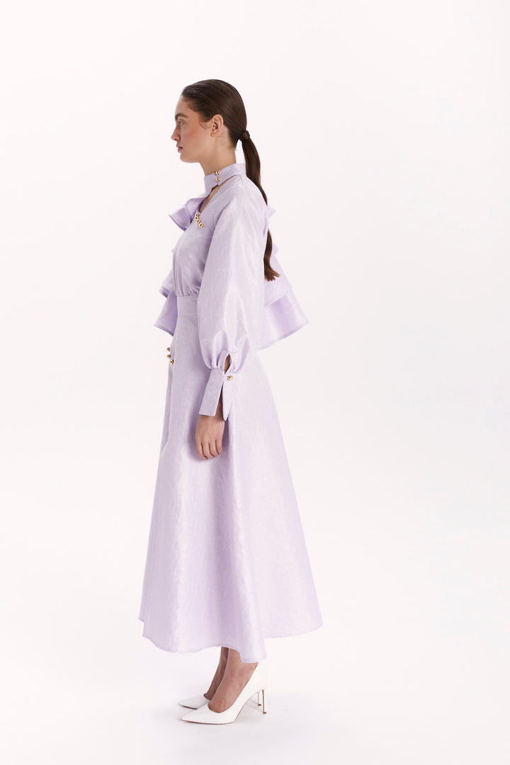 DRESS WITH DECORATIVE BUTTONS AND A SLIT