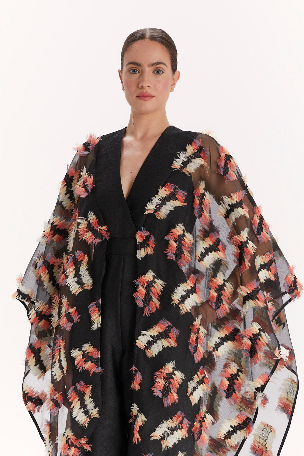 JUMPSUIT WITH WIDE TULLE SLEEVES AND MULTICOLORED FRINGE