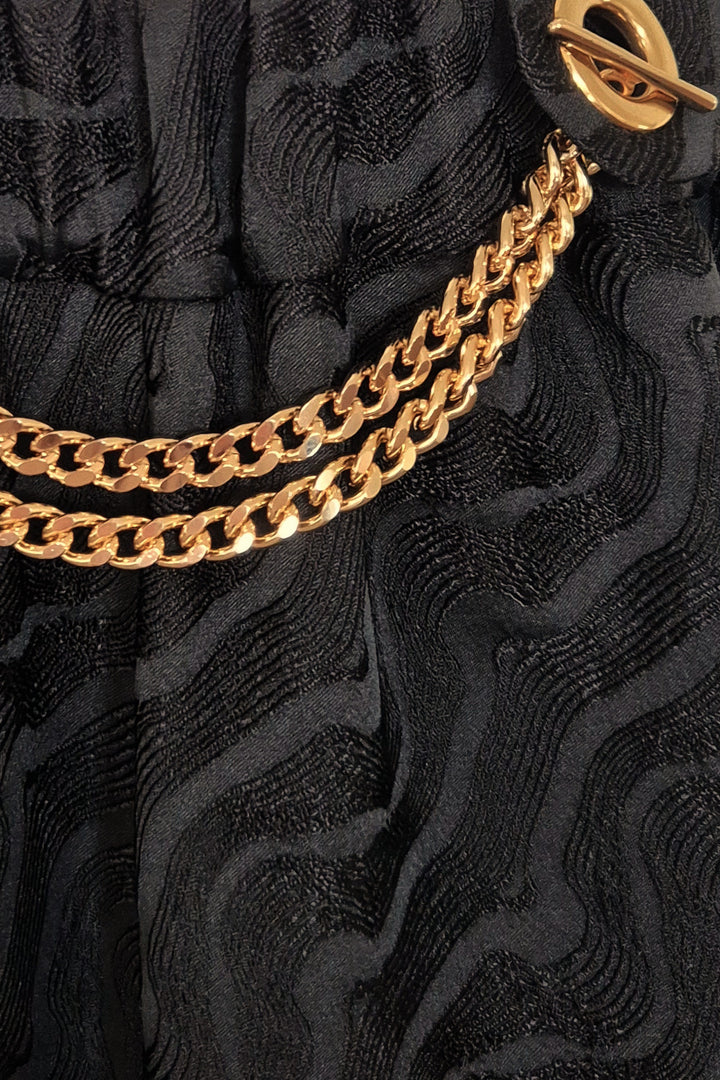 ZOEY BALLOON-FIT TROUSERS WITH GOLDEN CHAIN