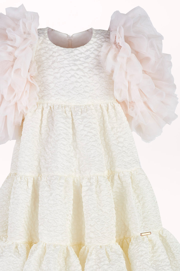 DRESS IN BUBBLE-TEXTURED FABRIC WITH TULLE SLEEVES