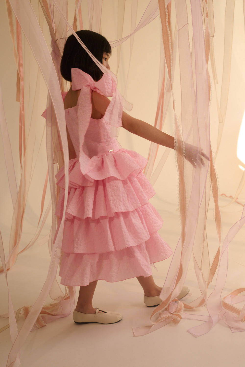 DRESS WITH FRILLS AND BOWS ON THE SHOULDER