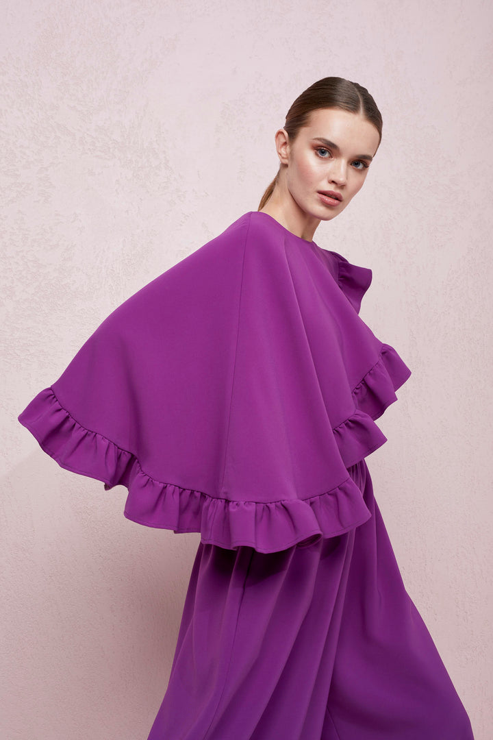 WIDE-LEG JUMPSUIT WITH AN ASYMMETRICAL CAPE