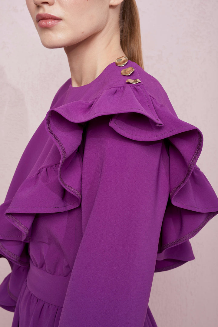 WIDE-LEG JUMPSUIT WITH AN ASYMMETRICAL CAPE