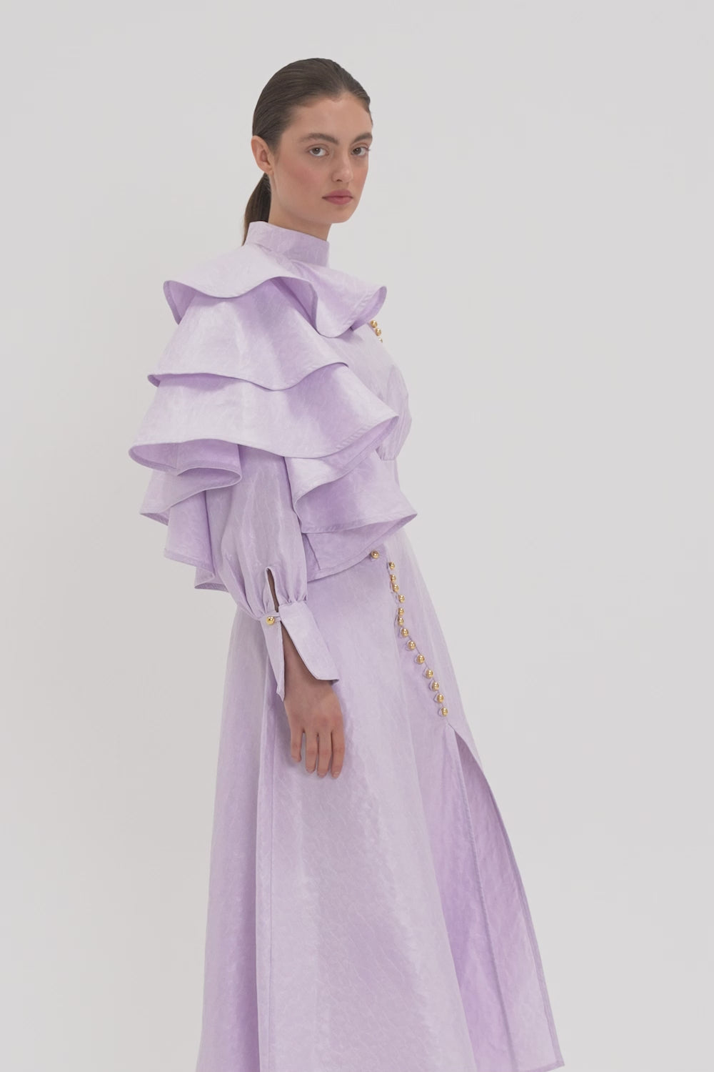 DRESS WITH DECORATIVE BUTTONS AND A SLIT